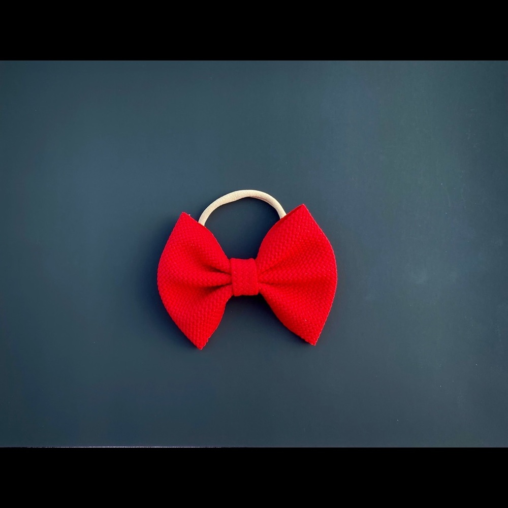 Red bows for babies and girls